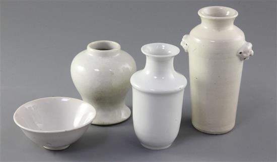 A Chinese Dehua blanc de chine vase, 17th century and two white glazed vases and a bowl, Qing dynasty, 9.3cm - 15cm